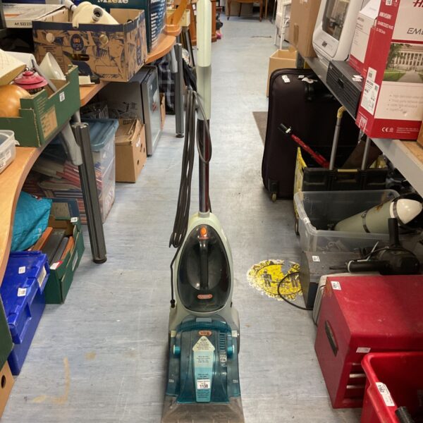 Used Vax Rapide carpet cleaner for home floor cleaning.