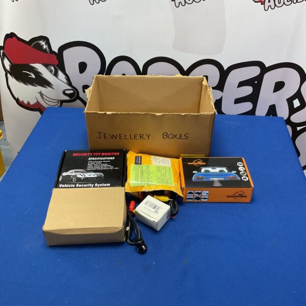 Vehicle security system with TFT monitor in original packaging.