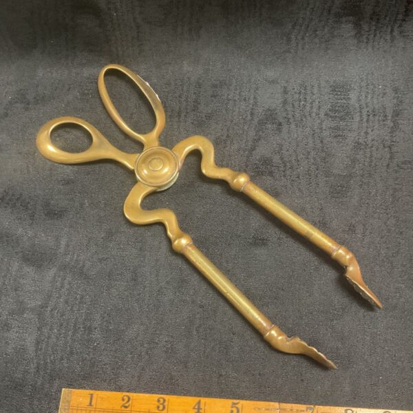 Antique Victorian brass coal tongs for fireplace use.