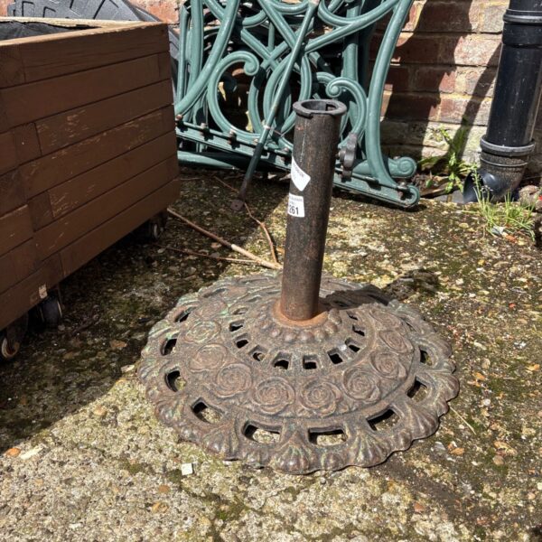Intricate Victorian cast iron umbrella stand for hall storage.