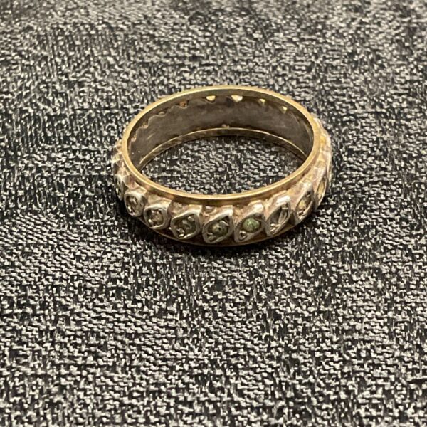 Antique Victorian eternity ring with square cut gemstones in silver and gold.