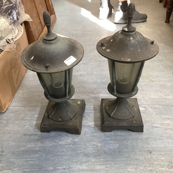 Antique Victorian gatepost lamps, a pair of weathered garden lights.