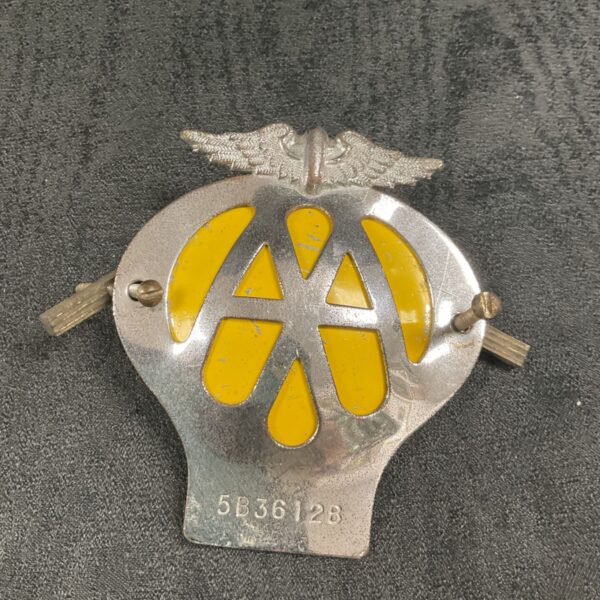 Vintage AA grill badge for classic car restoration.