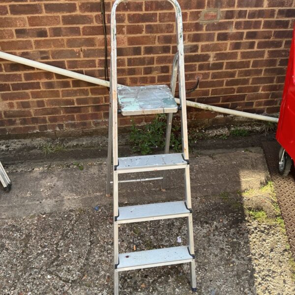 Vintage aluminium step ladder for garden and DIY tasks.