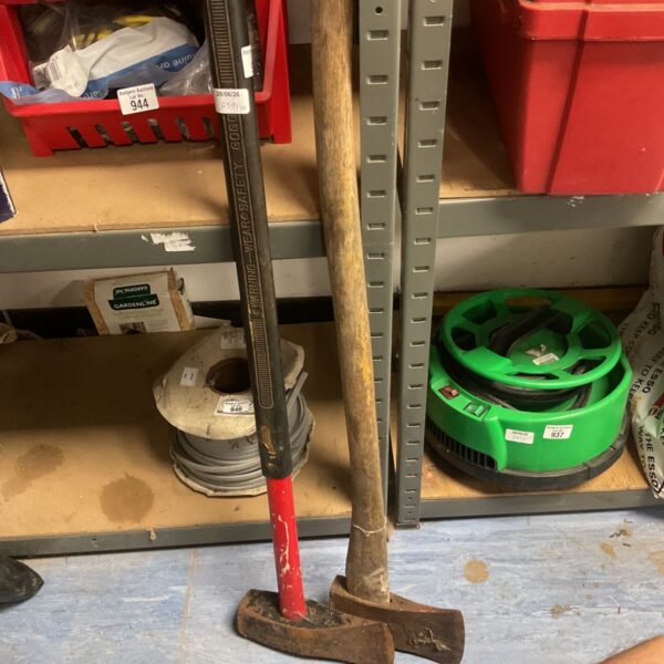 Pair of vintage axes with wooden handles, ideal for garden or tool collecting.