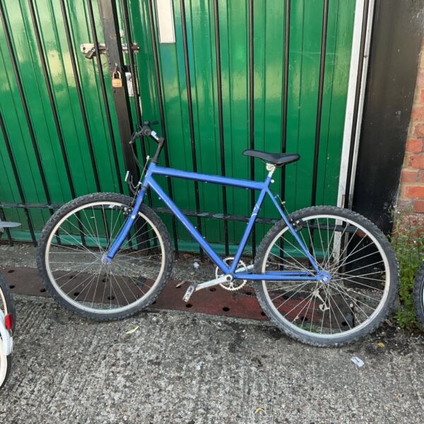 Blue vintage bicycle with Shimano gearing, ideal for restoration.
