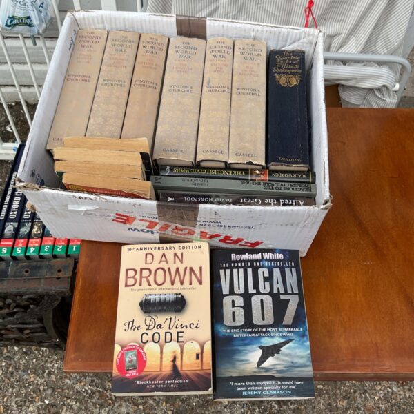 Vintage book collection featuring Shakespeare and Winston Churchill books.