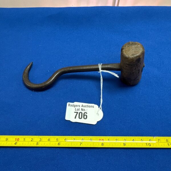 Vintage iron butcher's hook for meat hanging.