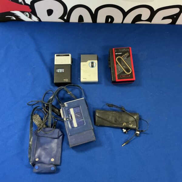 Vintage Philips and Sharp cassette players with FM stereo tuner.