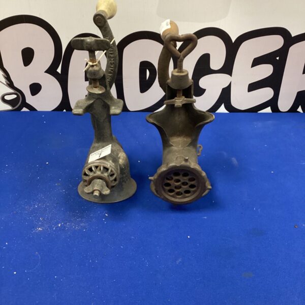 Vintage cast iron table mincer for grinding meat and vegetables.