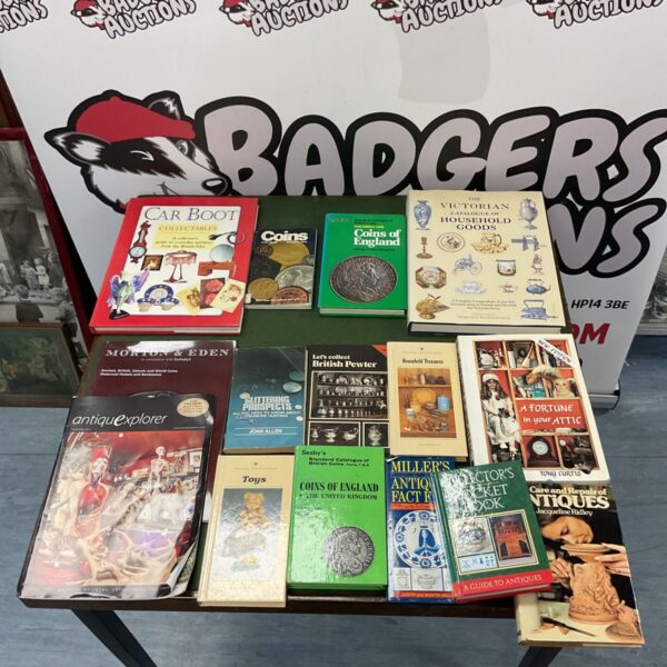 Vintage collectible books including guides to coins and car boot finds.