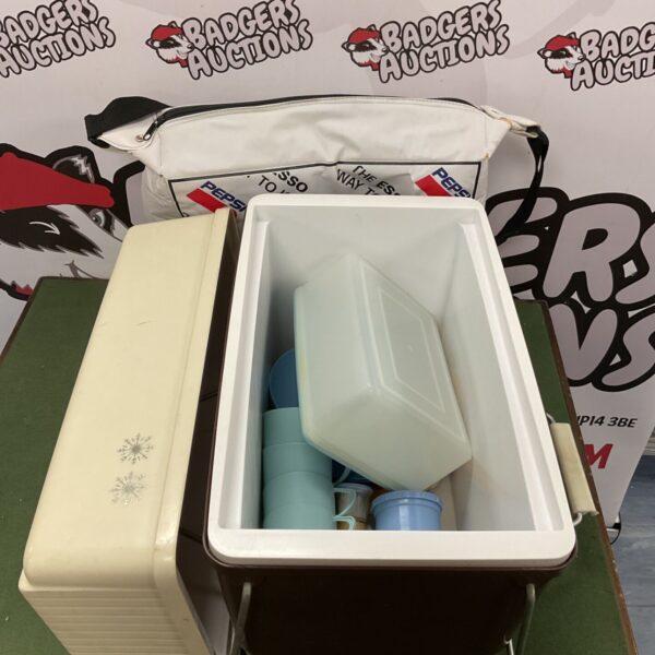 Vintage plastic cooler box with picnic set contents.