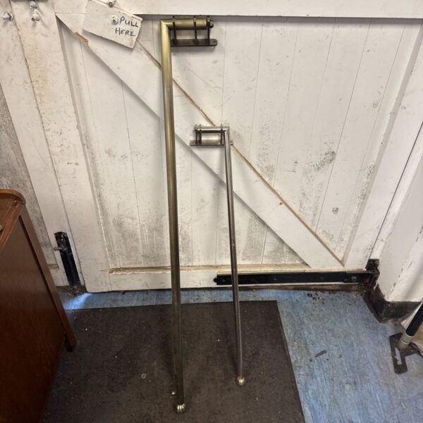 Vintage metal curtain poles, 44 and 32 inches long, for home decor.