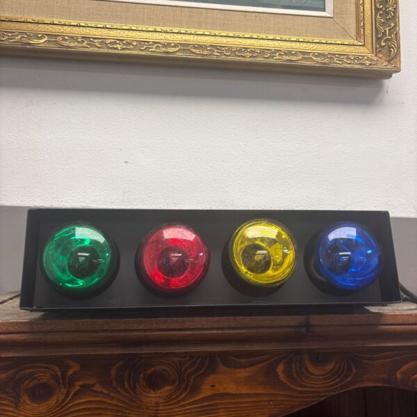 Vintage four-channel disco light with coloured lenses.