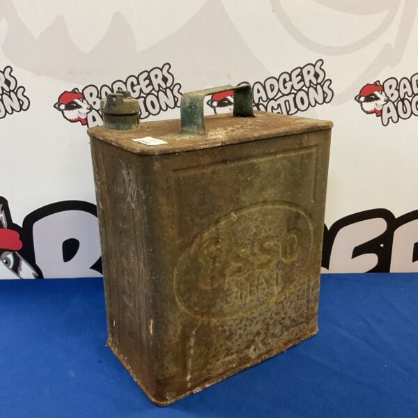 Vintage Esso fuel can with brass cap, a collectible petroliana item.