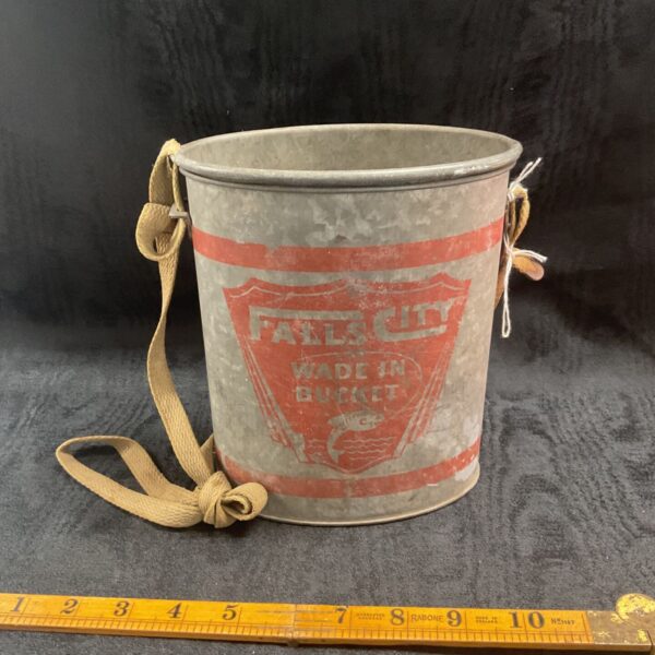 Vintage Falls City bait bucket with red and silver design.