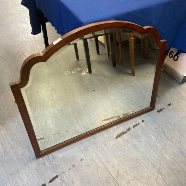 Vintage framed mirror with wooden frame, ideal for home decor.
