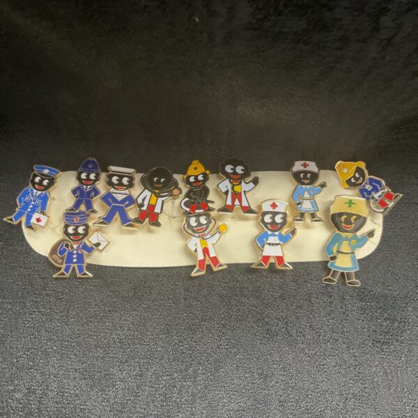 Group of twelve vintage Golly badges representing emergency services.