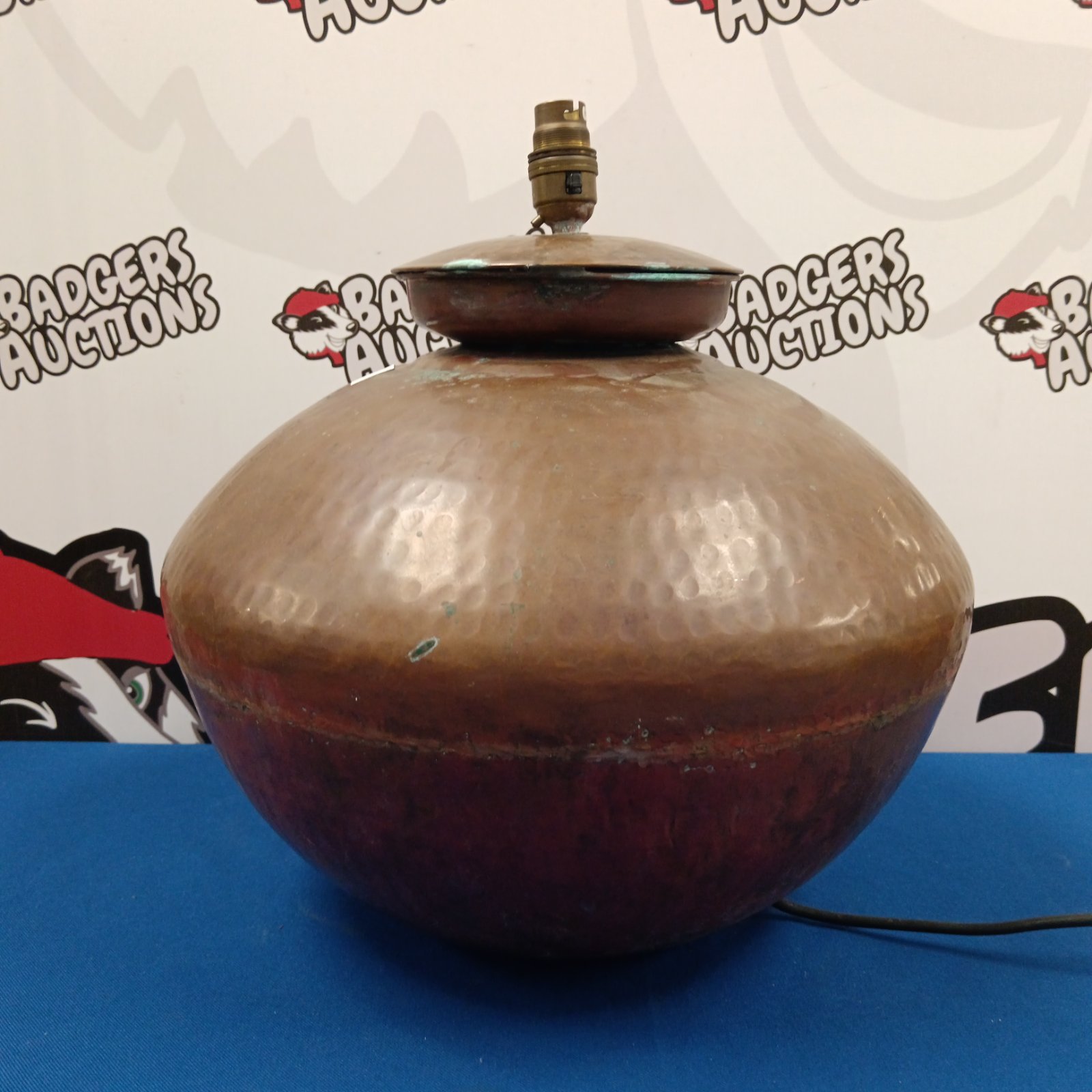 Vintage hammered copper table lamp with patina.