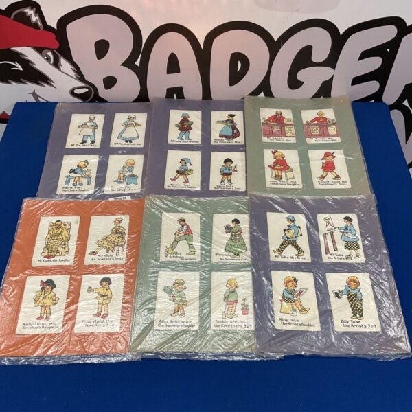 Vintage Happy Family cards, six sets of mounted collectible ephemera.