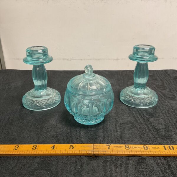 Vintage ice blue dressing table set with floral pressed glass.