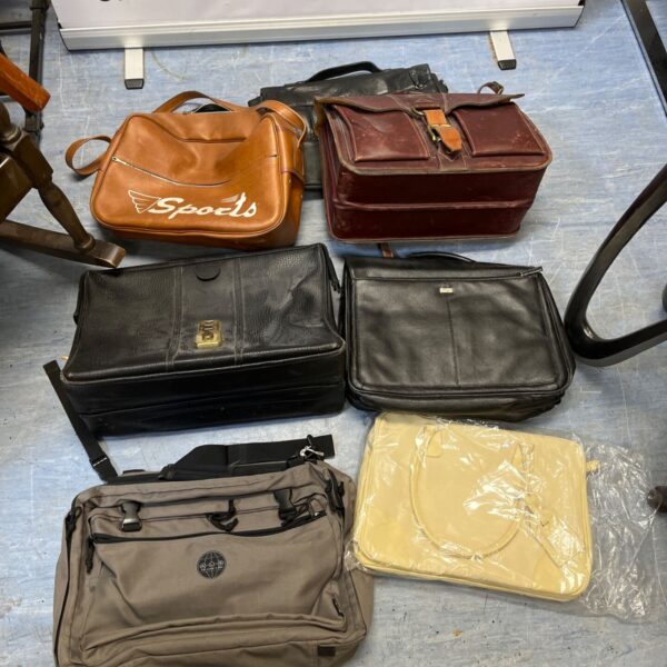 Job lot of three vintage leather shoulder bags in varying styles.
