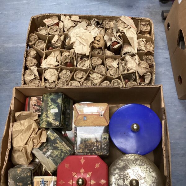 Vintage Mazda candle lamps and colourful tins in a mixed lot.