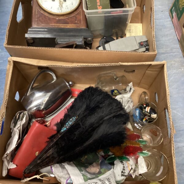 Vintage mixed lot featuring a mantle clock, feather duster, and glassware.