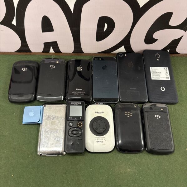 Vintage mobile phone lot including Blackberry and Apple iPhones.