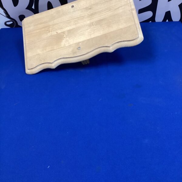 Vintage pine shelf with a shaped front, ideal for rustic decor.