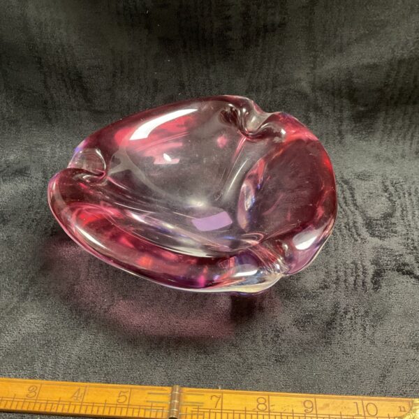 Vintage pink glass ashtray in Murano style, a collectible home decor item.