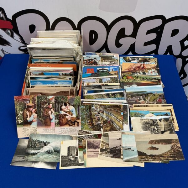 Vintage postcard collection with varied scenes and designs.