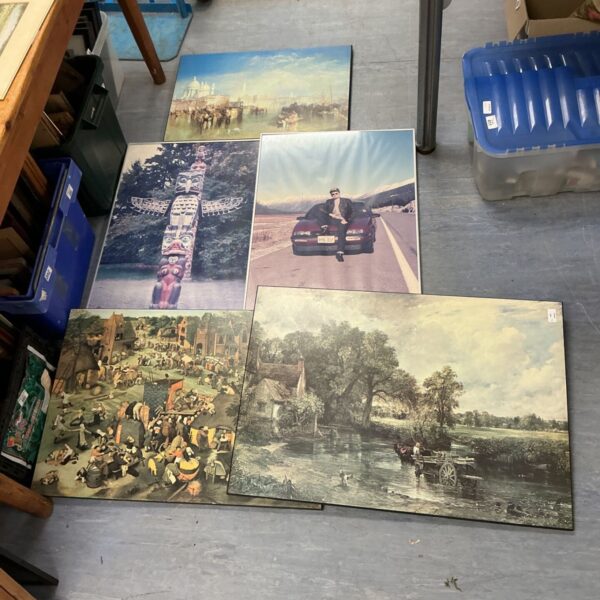 Vintage prints of country, town, and city scenes with totem pole photo.