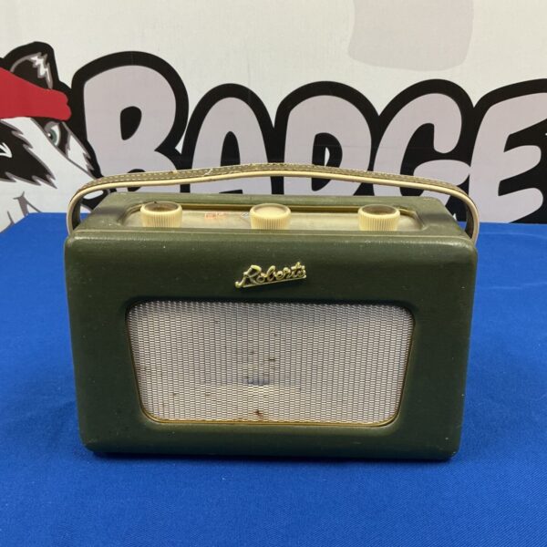 Vintage green Roberts R300 transistor radio, classic retro design.