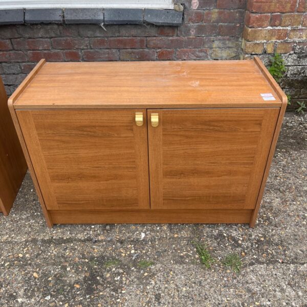 Vintage 1970s Schreiber record cabinet in warm wood tone.