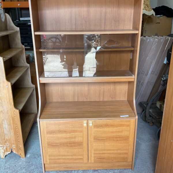 Vintage Schreiber teak bookcase with sliding glass doors.