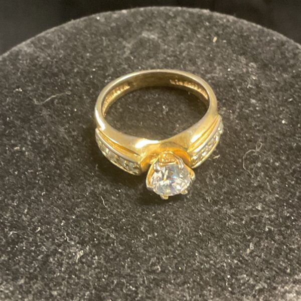 Vintage simulated diamond ring with gold plated band, size P.