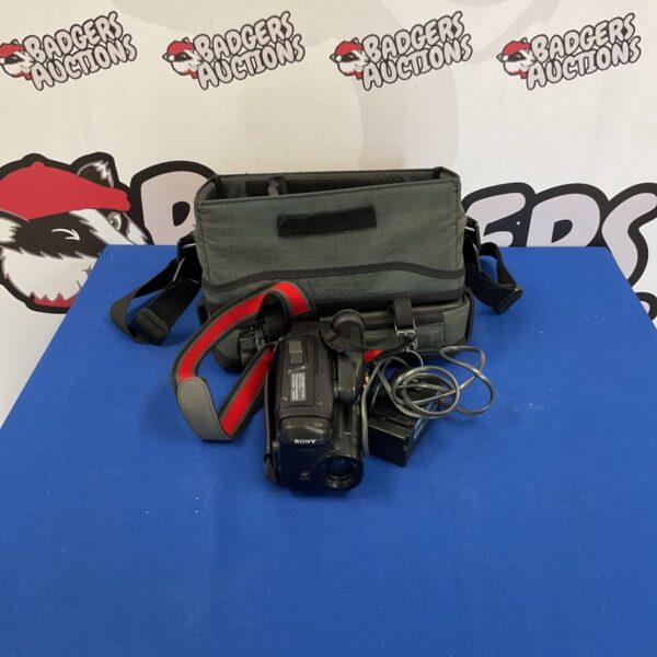 Vintage Sony DCR-TRV19E Handycam with carry case and cable.