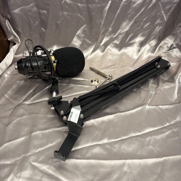 Vintage table top microphone with adjustable boom arm.