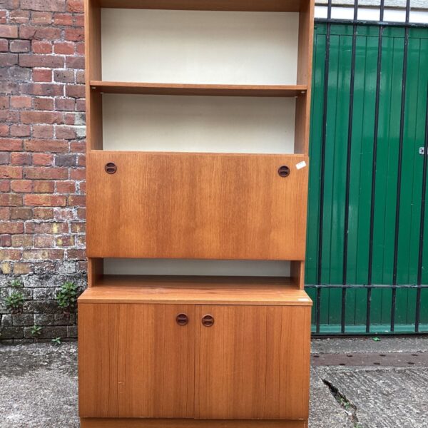 Vintage 1960s teak bookcase with cupboard storage.