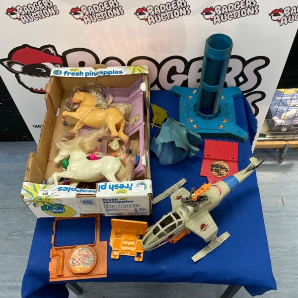 Vintage Thundercats, Barbie and Jurassic Park toy lot for collectors.