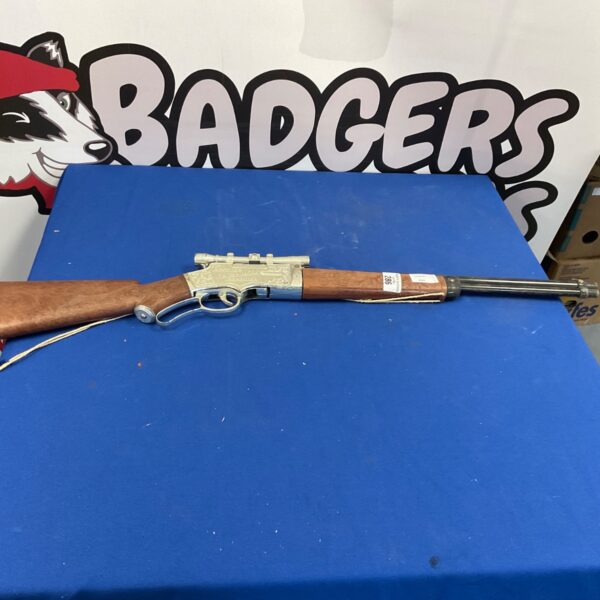 Vintage toy rifle for cowboys and Indians play, collectible item.