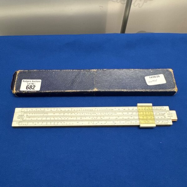 Vintage Unique Universal II slide rule in good condition.