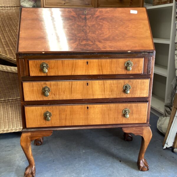 Vintage walnut bureau desk with drawers and cabriole legs.
