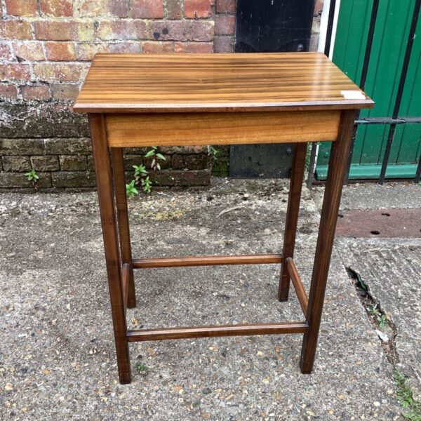 Vintage wood side table with a warm wood tone.