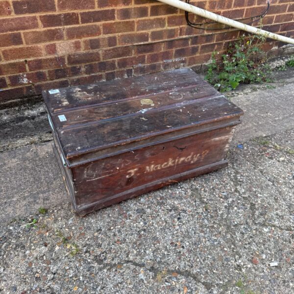 Vintage wooden storage box for restoration project.