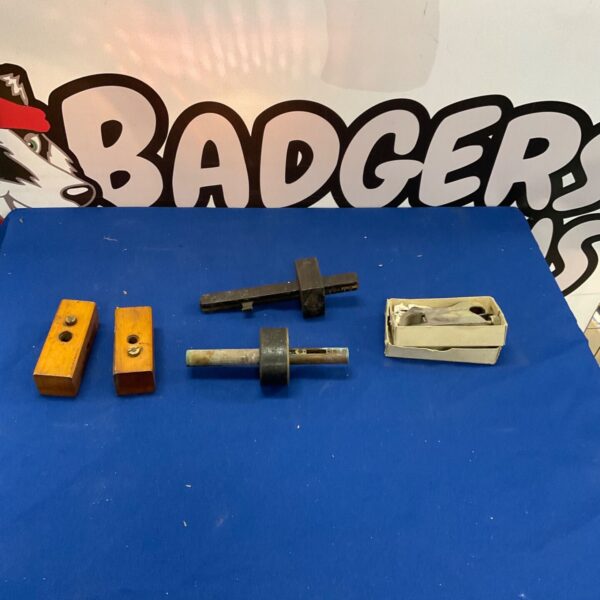 Vintage woodworking tools including a plane and chisel.