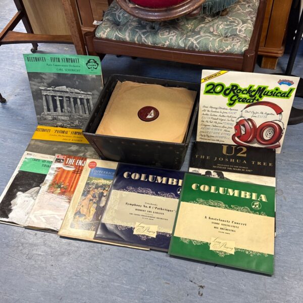 Vinyl record collection featuring U2 and Beethoven classical music.