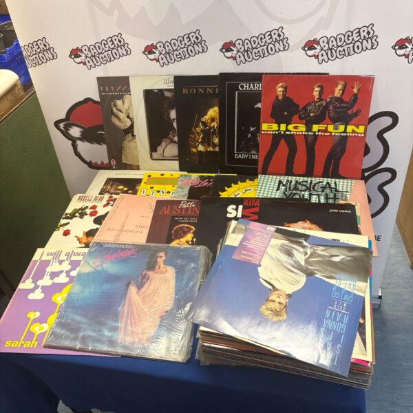 Collection of vintage 12 inch vinyl records from the 1980s.