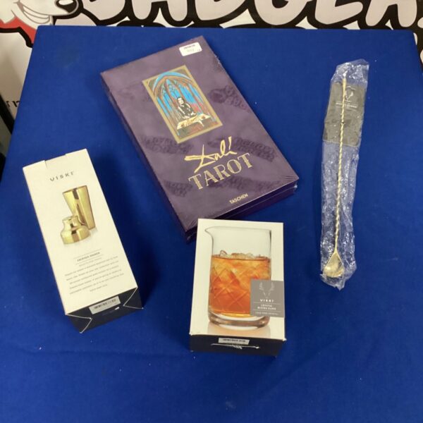 Viski cocktail set with Taschen Tarot cards displayed.
